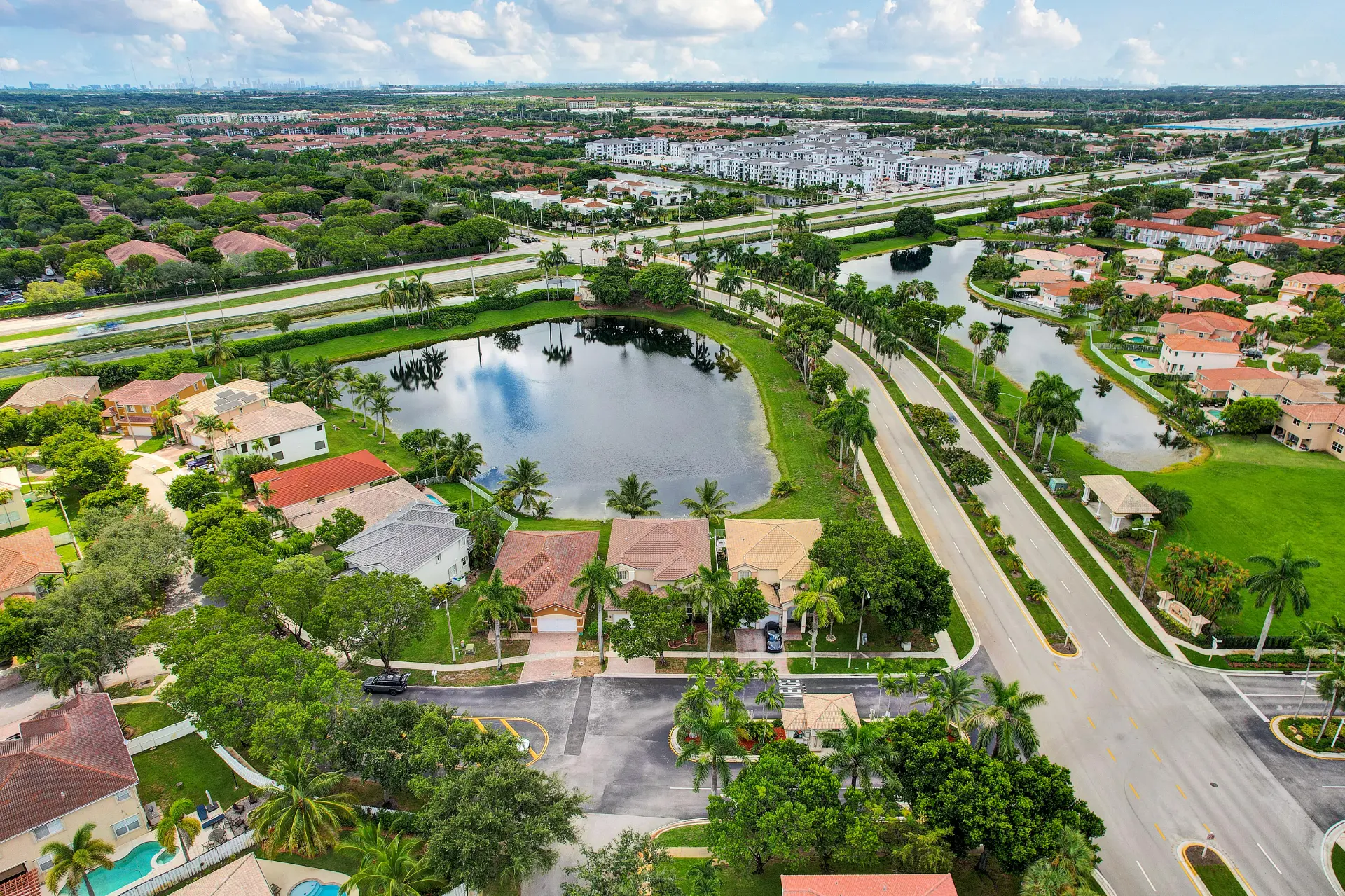 Aerial drone photograph of a South Florida lakefront neighborhood