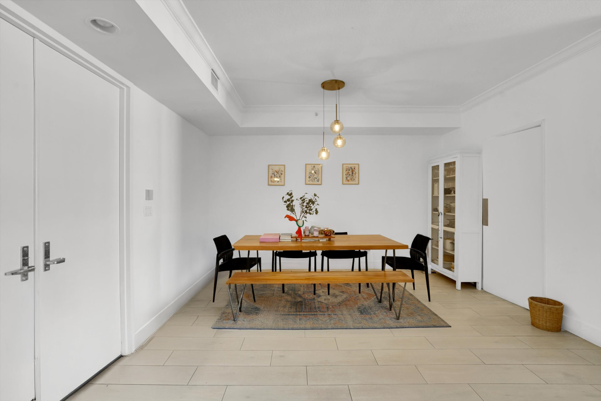 Clutter and object removal: clean, brightened condo dining room with clear floors